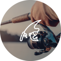 A person turning the reel on a fishing rod.